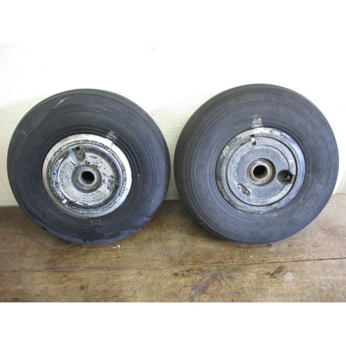 251 - Two vintage aircraft wheels, with tyres, believed to be front wheels from a DH114 Heron, in used con... 