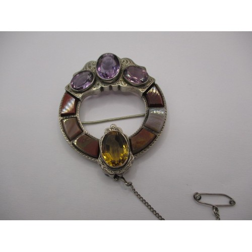 116 - A vintage white metal brooch set with semi-precious and hard stones, approx. size 6x5cm, approx. wei... 