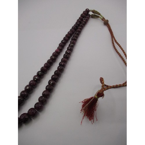 155 - A vintage ruby necklace, graduated sized beads. Appox. Linear length 48cm, approx. gross weight 168g... 