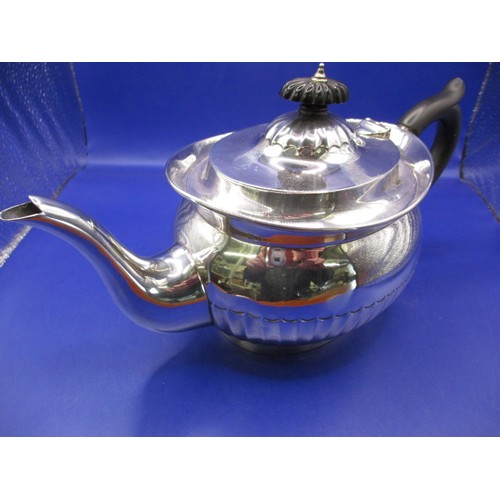 128 - An antique sterling silver and ebony handled teapot, London hallmark. In good used condition, with a... 