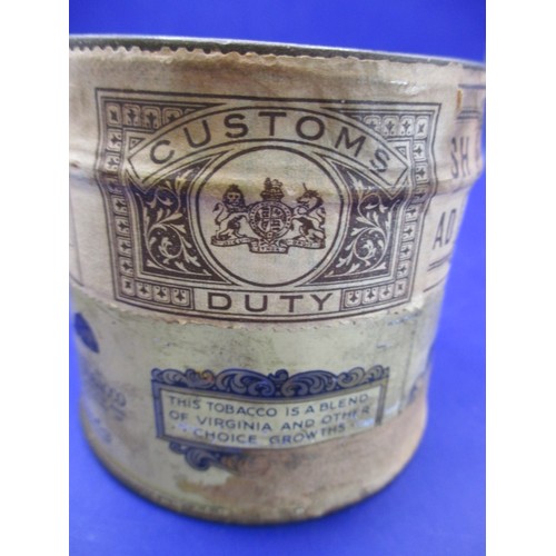 167 - An early 20th century un-opened tin of Gold Block fine Virginia cut plug tobacco and a later full ti... 