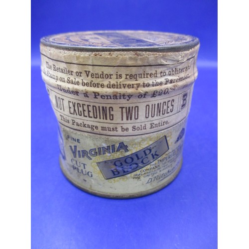 167 - An early 20th century un-opened tin of Gold Block fine Virginia cut plug tobacco and a later full ti... 