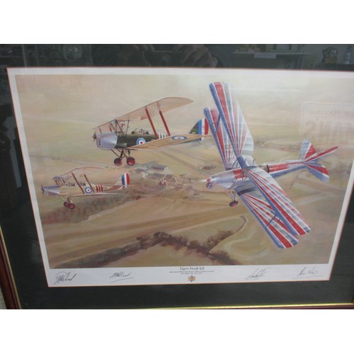 293 - A framed print of Tiger Moths in flight, 4 signatures to footer, approx. frame size 60x76cm in good ... 