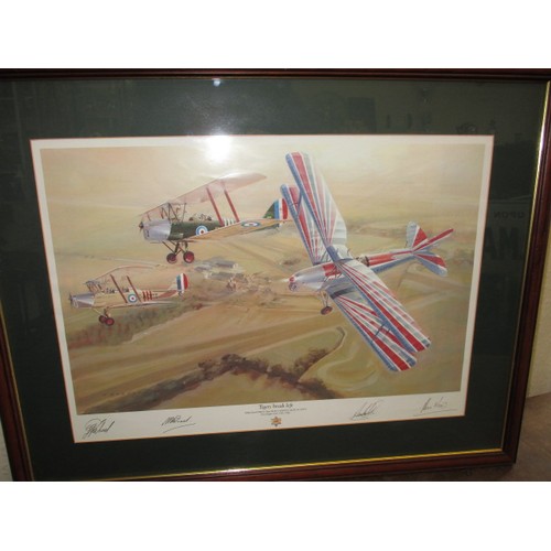 293 - A framed print of Tiger Moths in flight, 4 signatures to footer, approx. frame size 60x76cm in good ... 