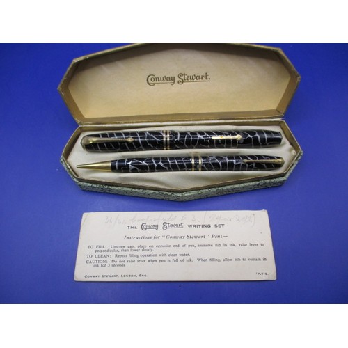 169 - A vintage Conway Stewart writing set, in original box and with instruction card, in good vintage use... 