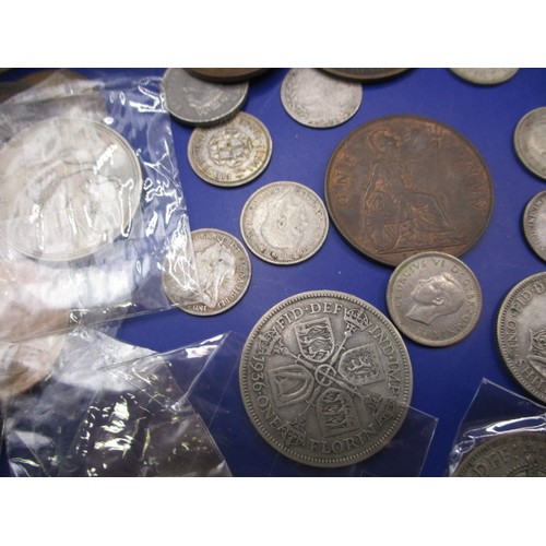 142 - A parcel of vintage world coins, to include silver and part silver examples, most circulated but som... 