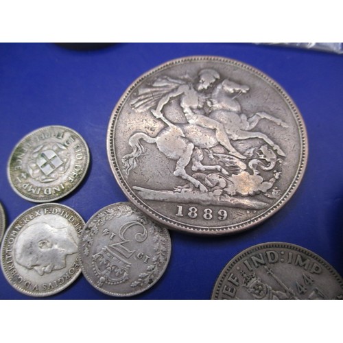 142 - A parcel of vintage world coins, to include silver and part silver examples, most circulated but som... 