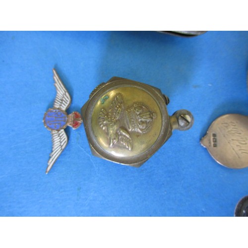 162 - A parcel of interesting collectables to include a silver cased pocket watch, powder compacts and wri... 