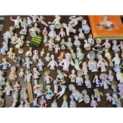 257 - A large collection of antique and later porcelain half dolls, to include good art deco examples, als... 