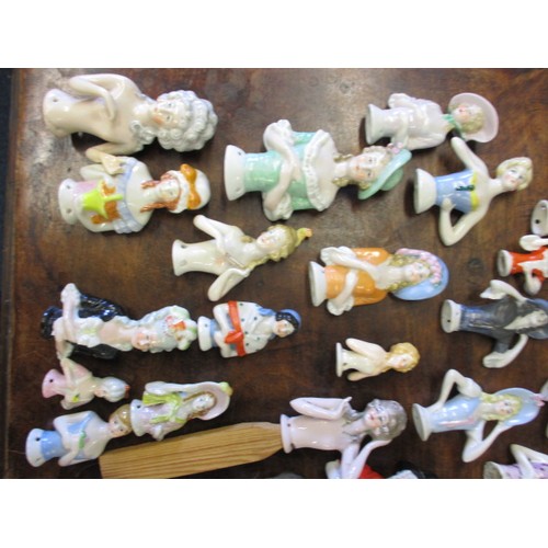 257 - A large collection of antique and later porcelain half dolls, to include good art deco examples, als... 