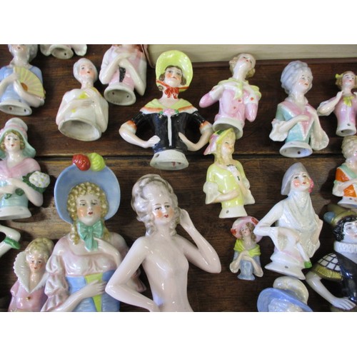 257 - A large collection of antique and later porcelain half dolls, to include good art deco examples, als... 