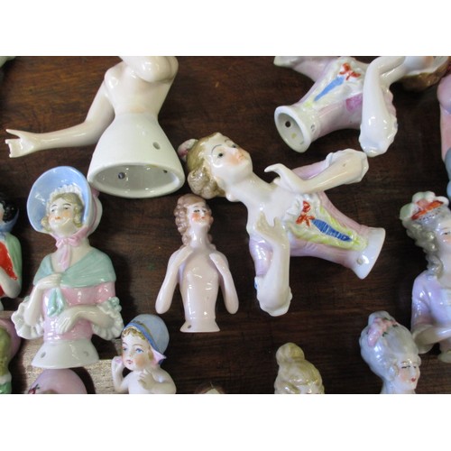 257 - A large collection of antique and later porcelain half dolls, to include good art deco examples, als... 