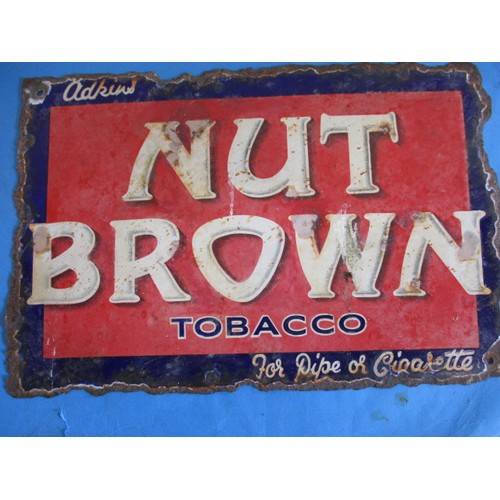 266 - An early 20th century double sided enamel advertising sign for Nut Brown Tobacco, having rusted edge... 