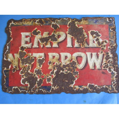 266 - An early 20th century double sided enamel advertising sign for Nut Brown Tobacco, having rusted edge... 