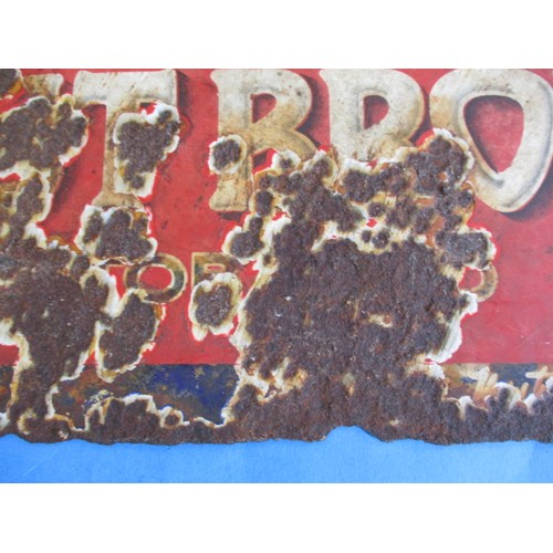 266 - An early 20th century double sided enamel advertising sign for Nut Brown Tobacco, having rusted edge... 