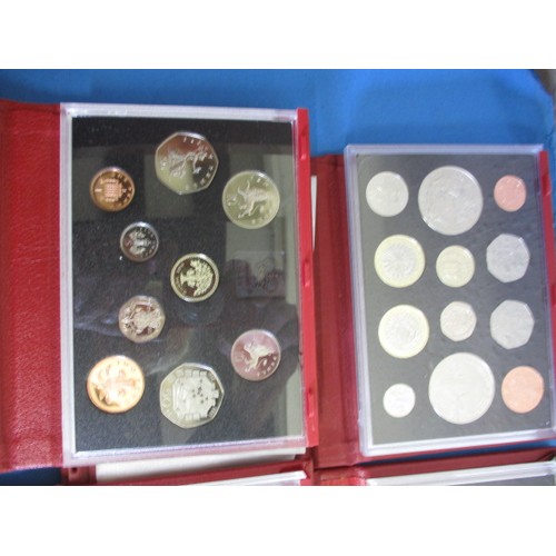 145 - Royal Mint United Kingdom proof coin sets in the red Deluxe version, 10 sets and all in original dis... 