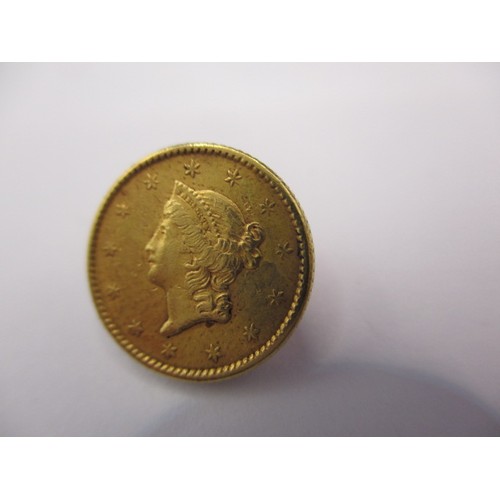 101 - An 1852 American $1 gold coin, a good grade with fine definition of features, approx. weight 1.7g