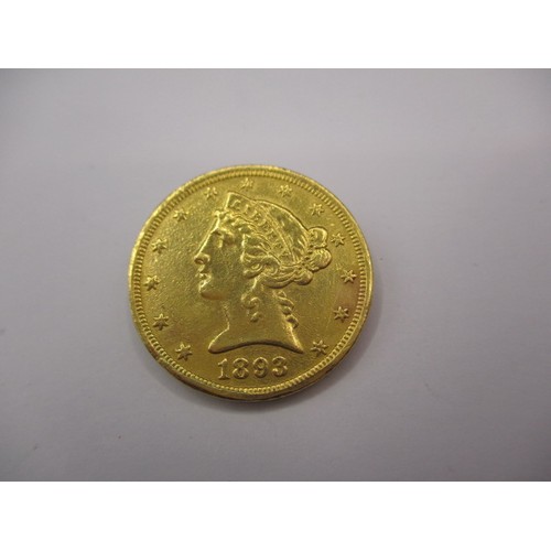 100 - An 1893 American $5 gold coin with liberty head and motto, type 2, a good grade circulated coin with... 