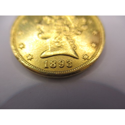 100 - An 1893 American $5 gold coin with liberty head and motto, type 2, a good grade circulated coin with... 