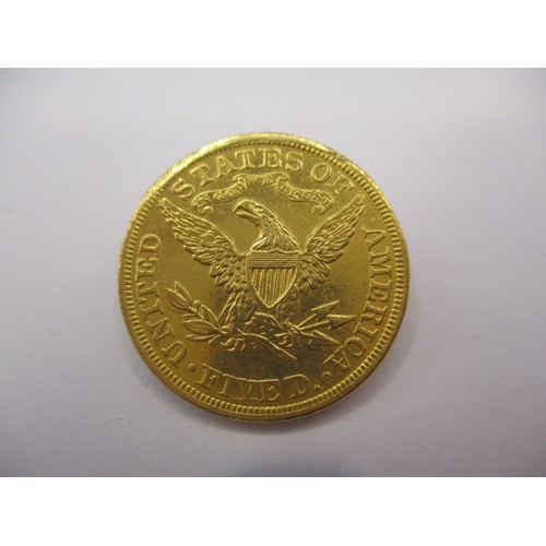 100 - An 1893 American $5 gold coin with liberty head and motto, type 2, a good grade circulated coin with... 