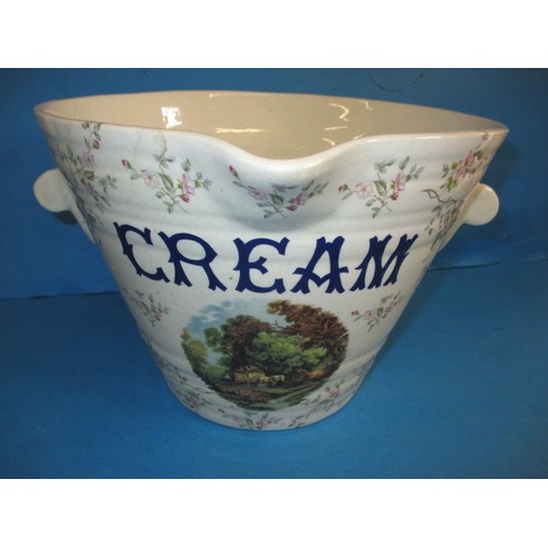 319 - A 19th century pottery cream pail, with polychrome decoration, approx. height 20cm having glaze craz... 