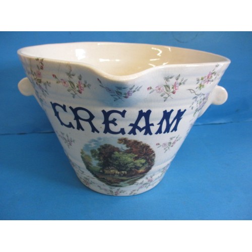 319 - A 19th century pottery cream pail, with polychrome decoration, approx. height 20cm having glaze craz... 