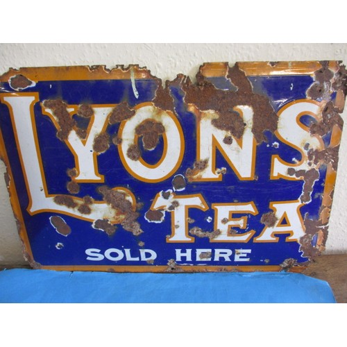 265 - An early 20th century domed enamel advertising sign for Lyons Tea, approx. size 75x50cm having rust ... 