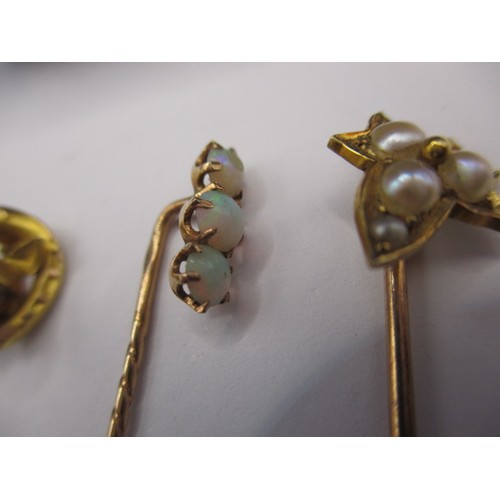 55 - Three gold stick pins and one white metal example, one having 3 nice opals, approx. weight of gold e... 