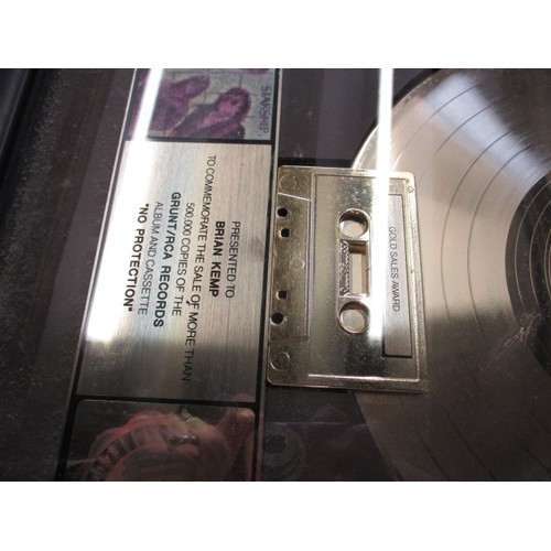 296 - A framed music award gold disc for 500,000 sales of the album No Protection by Starship in 1987, thi... 