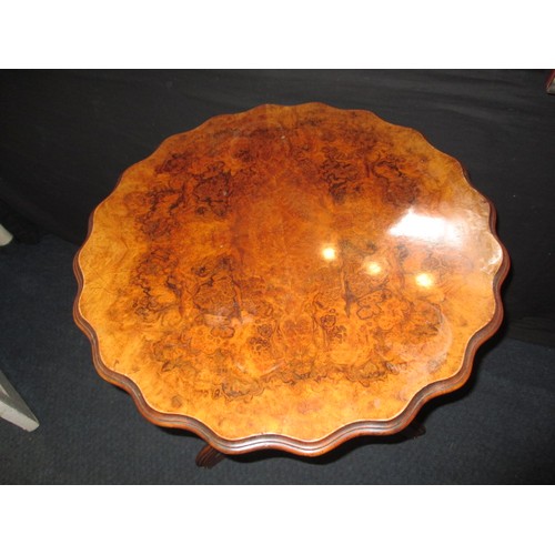 275 - A 19th century walnut scalloped top occasional table, rotating top from the base, approx. height 72c... 