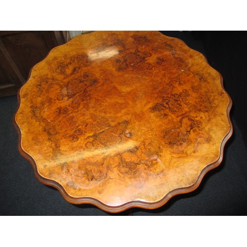 275 - A 19th century walnut scalloped top occasional table, rotating top from the base, approx. height 72c... 