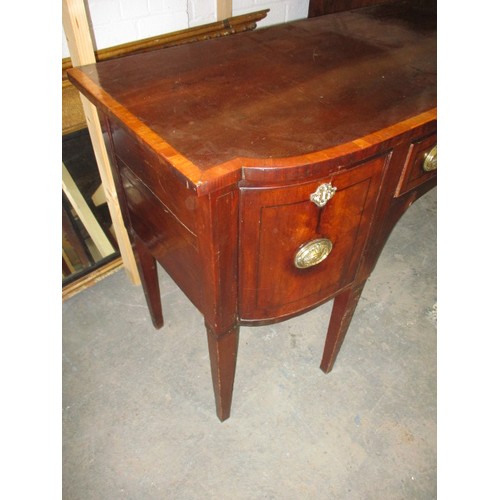 303 - A 19th Century sideboard. With 2 deep cellarette type drawers and central frieze drawer. Cross bandi... 