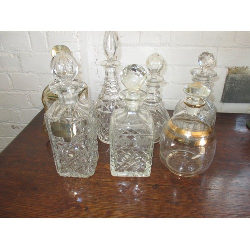 260 - 9 vintage glass drinks decanters all in good used condition, some antique