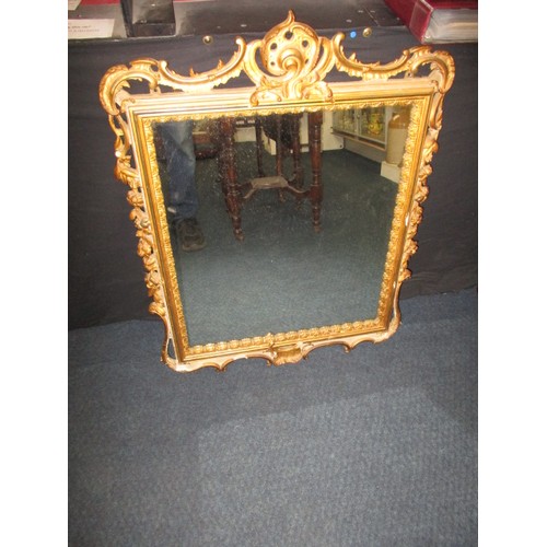 288 - A gilt framed wall mirror, approx. size 87x67, having some loss of gilding and general age-related m... 