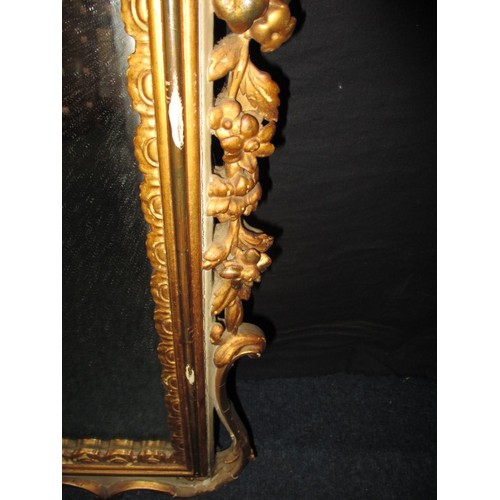 288 - A gilt framed wall mirror, approx. size 87x67, having some loss of gilding and general age-related m... 