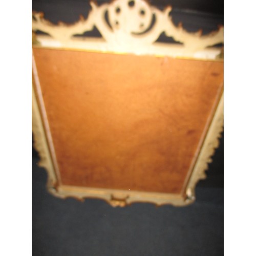 288 - A gilt framed wall mirror, approx. size 87x67, having some loss of gilding and general age-related m... 