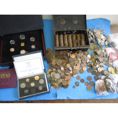 143 - A large quantity of vintage world coins, approx. 14kg in total, to include Royal Mint boxed sets