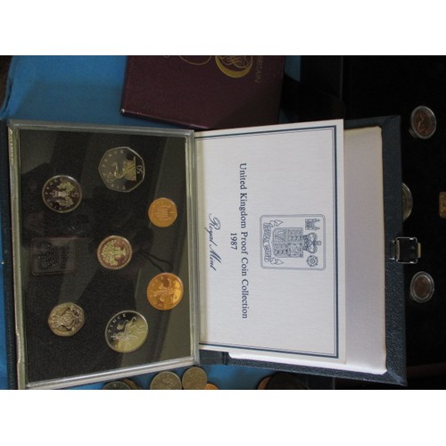 143 - A large quantity of vintage world coins, approx. 14kg in total, to include Royal Mint boxed sets