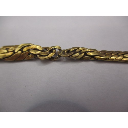 64 - An 18ct yellow gold necklace (approx. 10g) a 9ct yellow gold bracelet (approx. 10g) and a yellow met... 