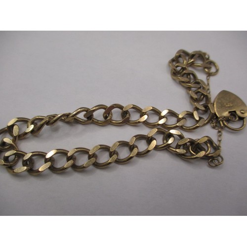 64 - An 18ct yellow gold necklace (approx. 10g) a 9ct yellow gold bracelet (approx. 10g) and a yellow met... 