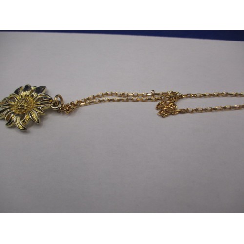 64 - An 18ct yellow gold necklace (approx. 10g) a 9ct yellow gold bracelet (approx. 10g) and a yellow met... 