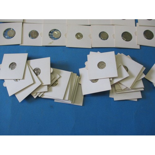 164 - A parcel of silver and part silver 3d and 6d coins, all in coin pouches and in circulated condition,... 