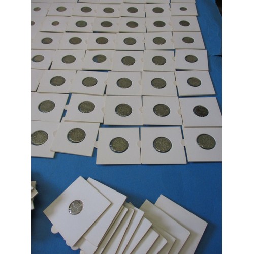 164 - A parcel of silver and part silver 3d and 6d coins, all in coin pouches and in circulated condition,... 