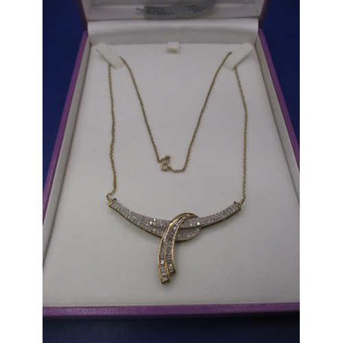 65 - A 9ct yellow gold necklace chain with diamond set gold comet pendant, approx. gross weight 7.2g, app... 