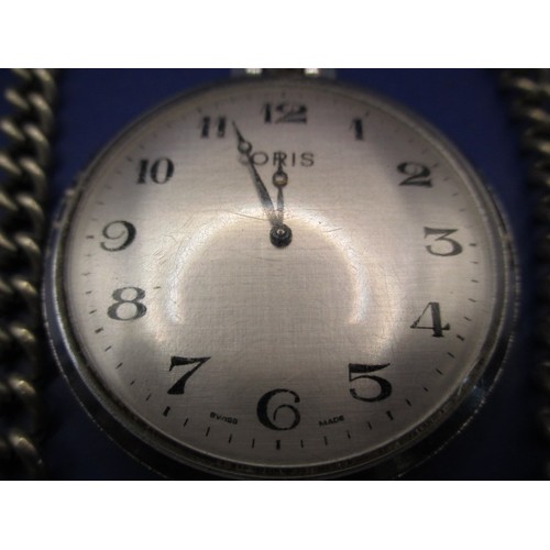 106 - A vintage Oris pocket watch with white metal Albert chain, in current working order with use-related... 