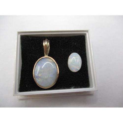 114 - Two vintage cabochon opals, one in a yellow metal pendant mount, approx. sizes 10.17mm x 7.22mm and ... 