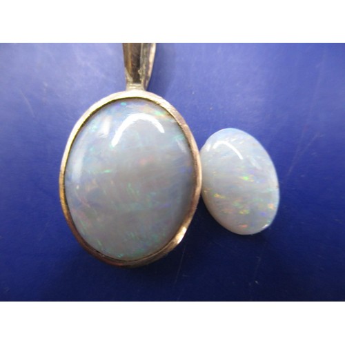 114 - Two vintage cabochon opals, one in a yellow metal pendant mount, approx. sizes 10.17mm x 7.22mm and ... 