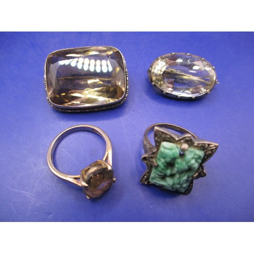 111 - A parcel of early 20th century gold and silver jewellery items, most with smoky quarts stones, to in... 