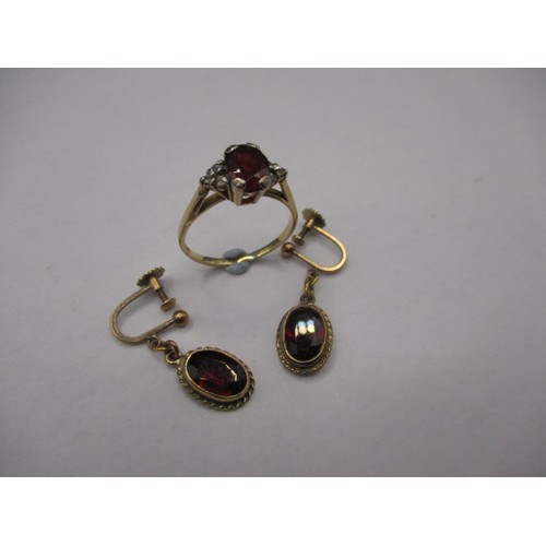 73 - A suit of antique gold and garnet jewellery to include a pair of screw on earrings and a ring, appro... 