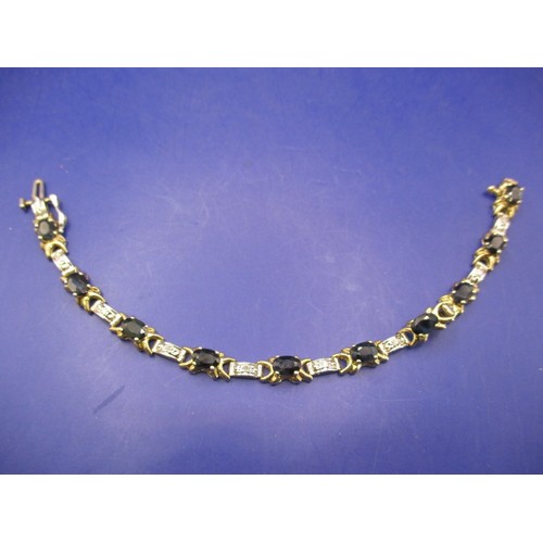 74 - A 14ct yellow and white gold, diamond and sapphire bracelet, approx. linear length 17cm, approx. wei... 